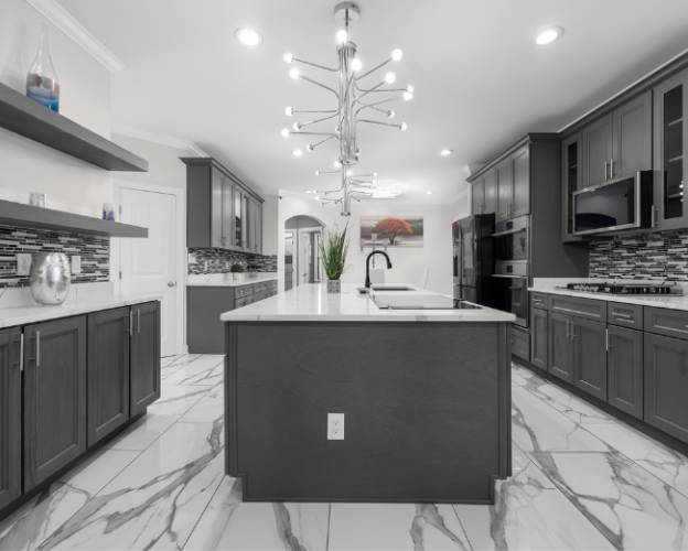 Modern-kitchen-interior-with-dark-cabinets-white-countertops-and-stylish-light-fixture Residential and Commercial Carpeting